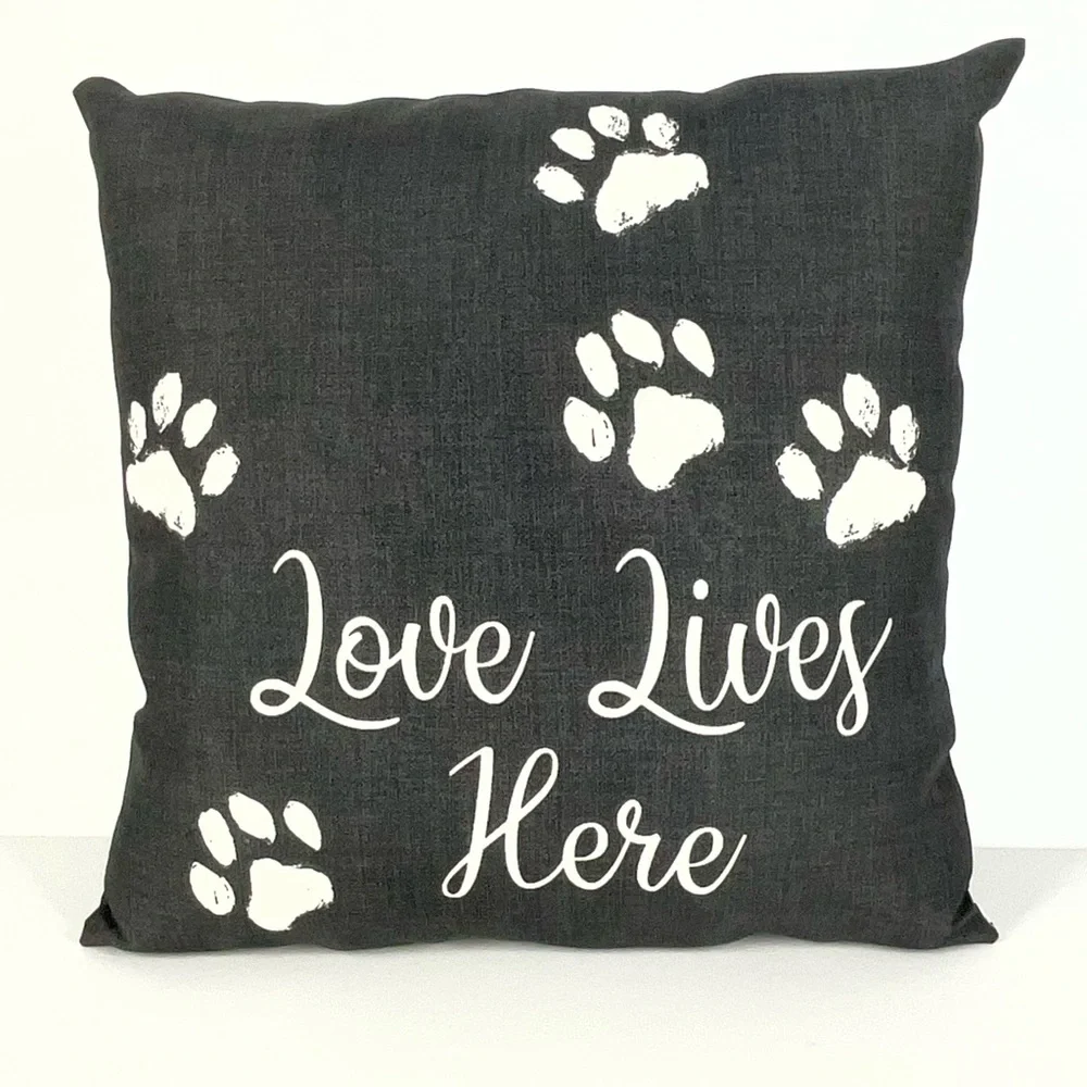 Mainstays Outdoor Black Pillow with White Paw Prints and Text‎ | 16 in. x 16 in.